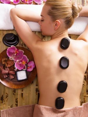 beautiful-woman-relaxing-spa-salon-with-hot-stones-body-beauty-treatment-therapy_186202-8795